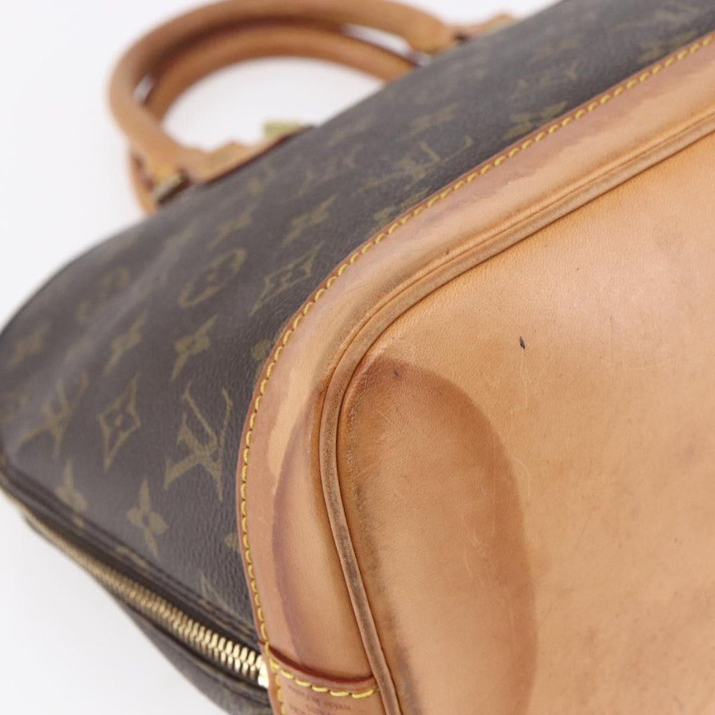 Louis Vuitton Alma Handbag Monogram Canvas Brown Canvas Handbag (Pre-Owned)