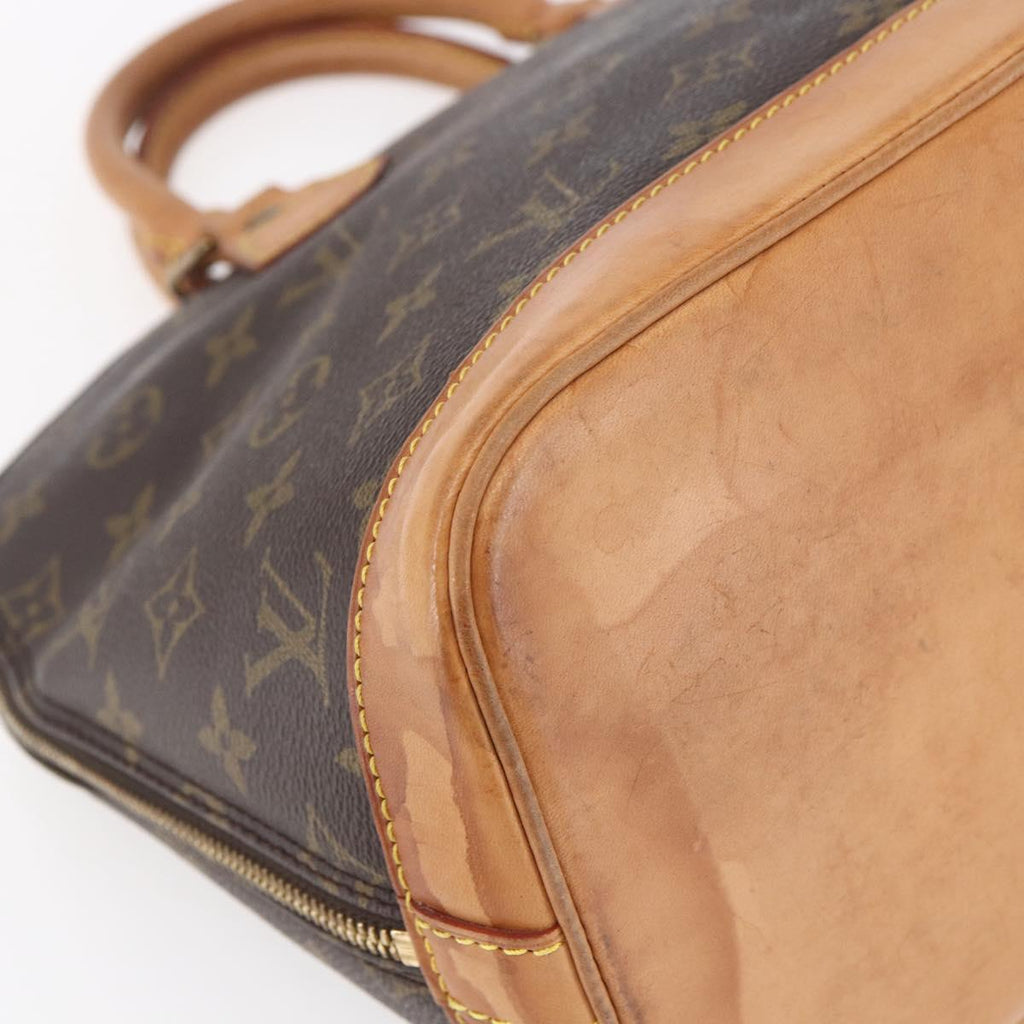 Louis Vuitton Alma Handbag Monogram Canvas Brown Canvas Handbag (Pre-Owned)