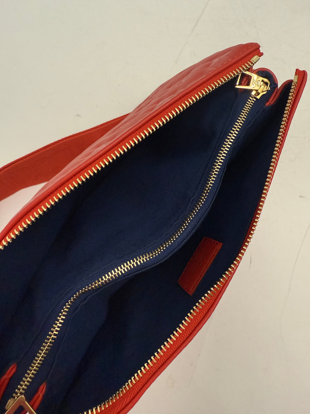 Red Monogram Embossed Lambskin Coussin PM
