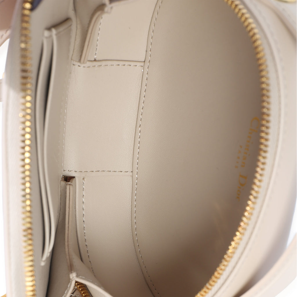 Cream Calfskin CD Signature Oval Crossbody Camera Bag