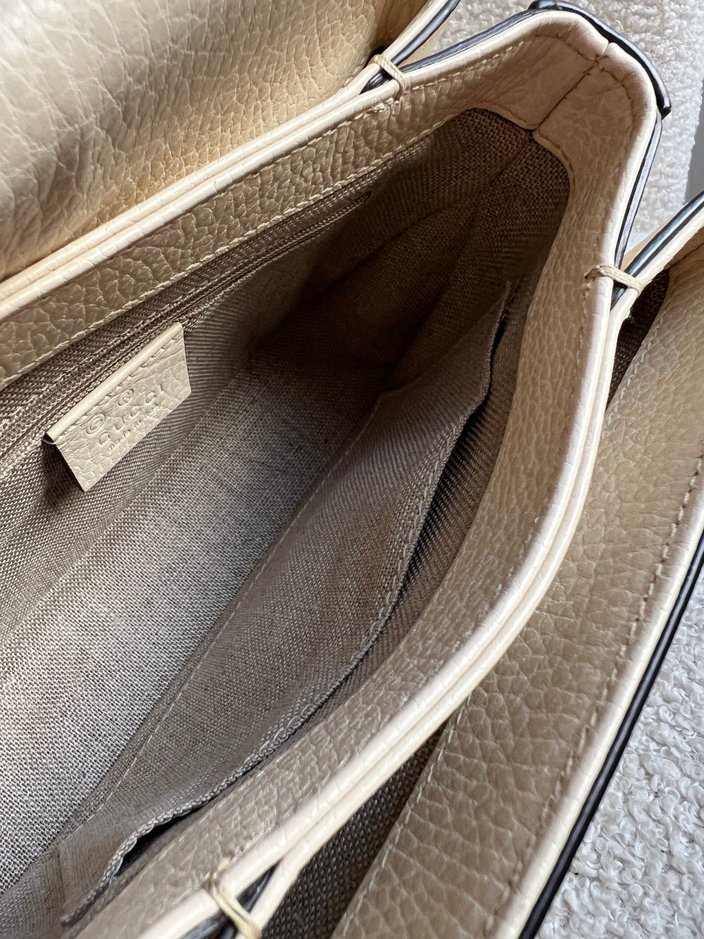 Gucci Interlocking GG Cream Mini Cross Body Bag