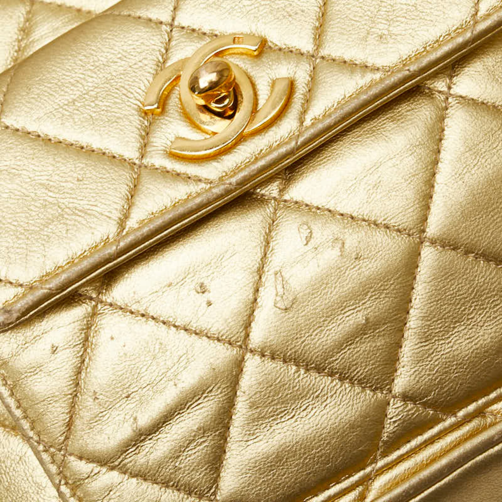 Chanel Gold Leather Backpack (Pre-Owned)