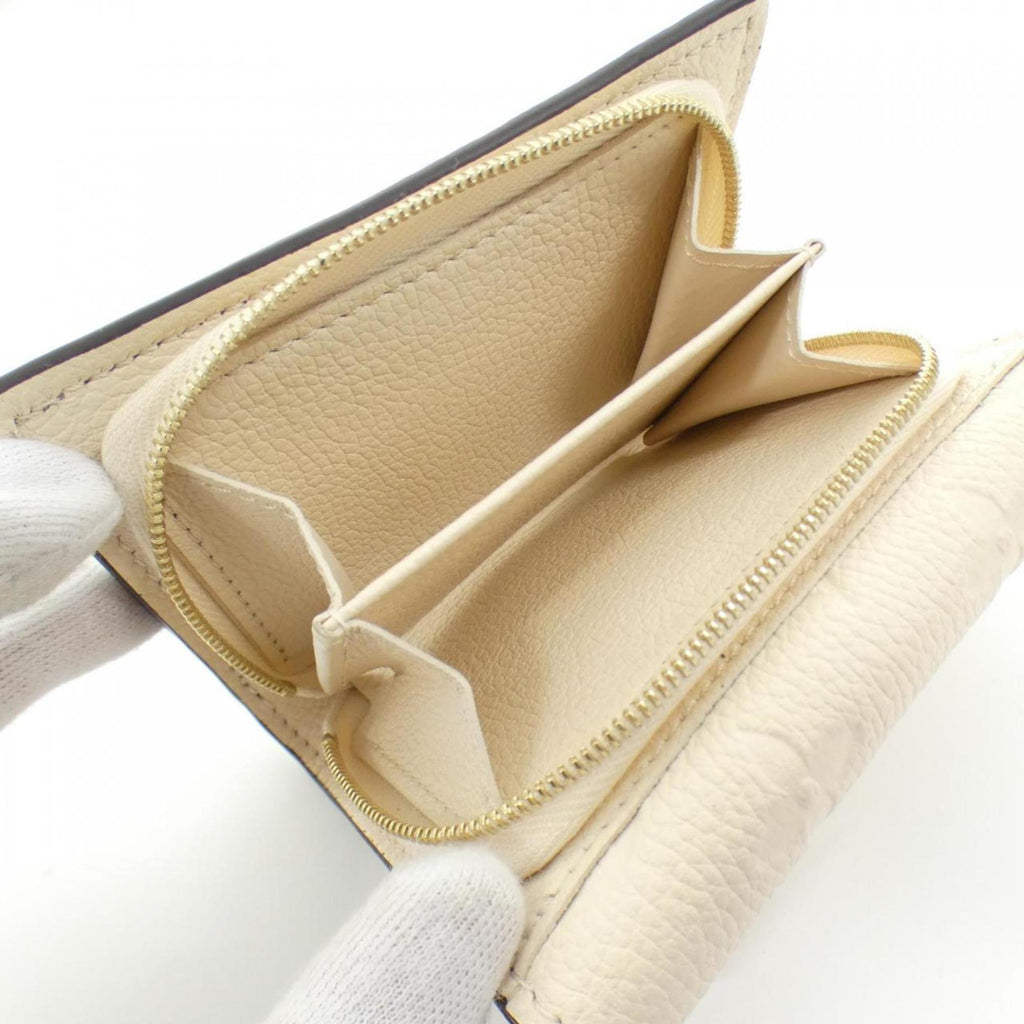 Louis Vuitton Monogram Empreinte Leather Wallet (Tri-Fold) (Pre-Owned)