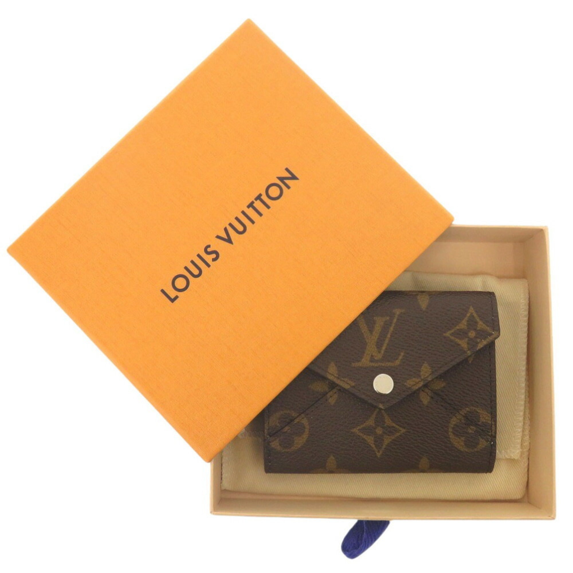 Louis Vuitton Blue Brown Monogram Monogram Leather Wallet (Tri-Fold) (Pre-Owned)