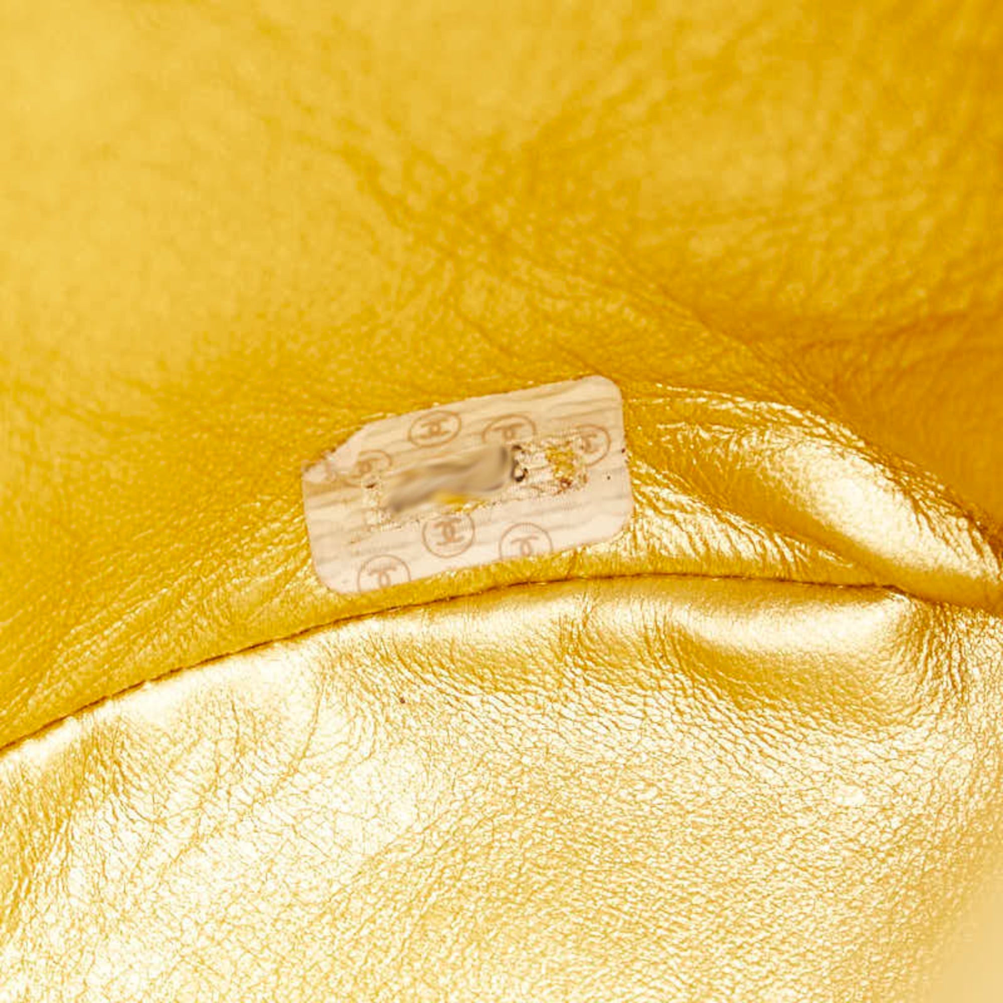 Chanel Gold Leather Backpack (Pre-Owned)
