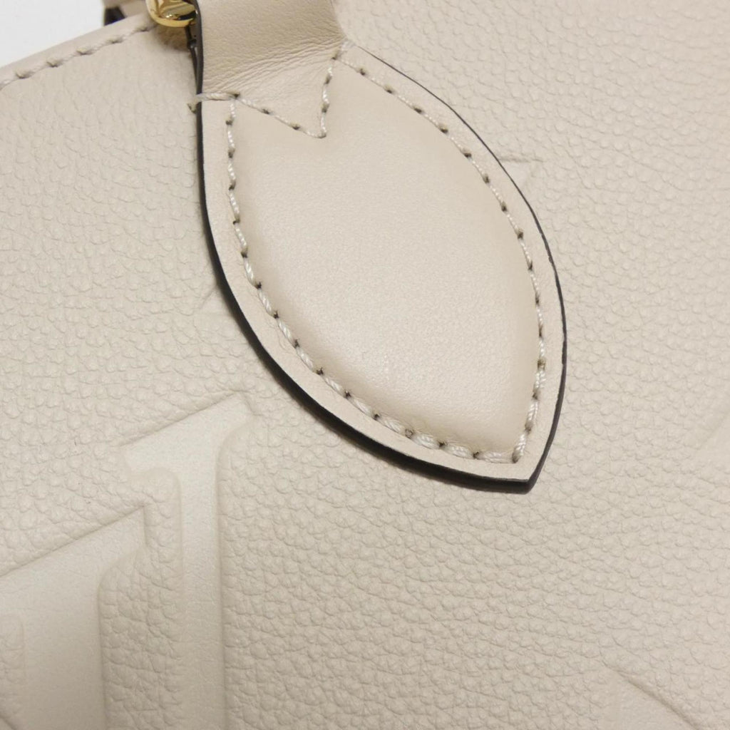 Louis Vuitton Monogram Empreinte Gold Leather Handbag (Pre-Owned)