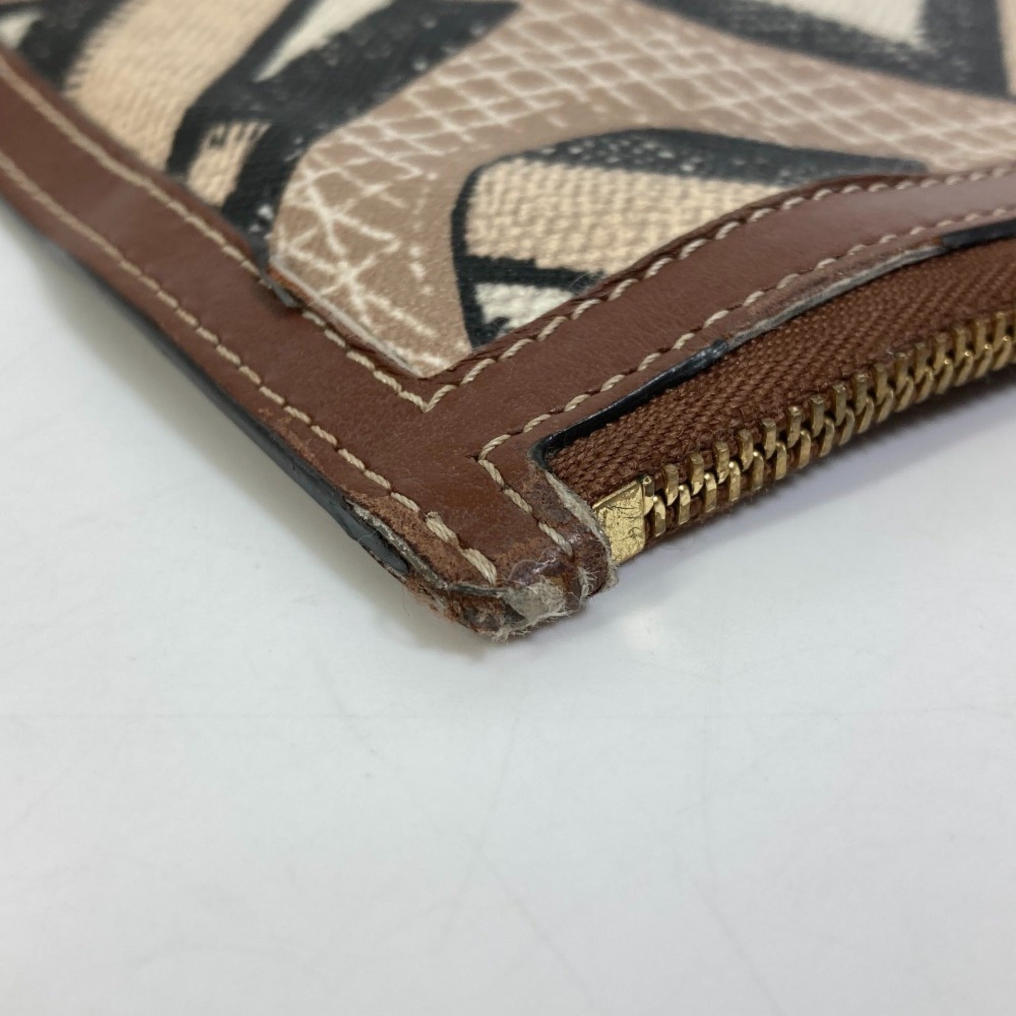 Burberry Brown Pvc Leather Clutch Bag (Pre-Owned)