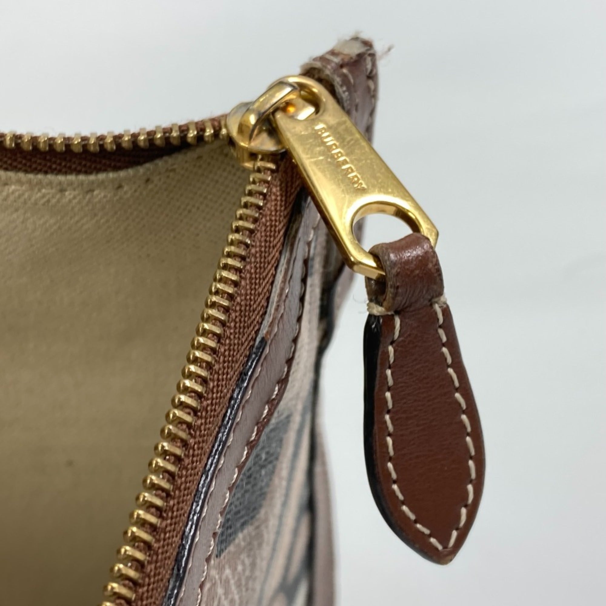 Burberry Brown Pvc Leather Clutch Bag (Pre-Owned)