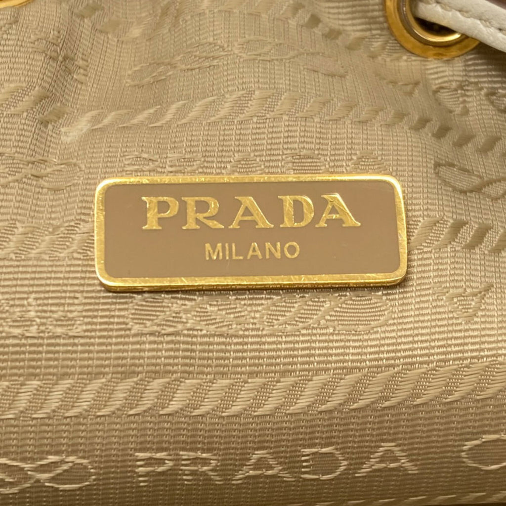 Prada Brown White Canvas Handbag (Pre-Owned)