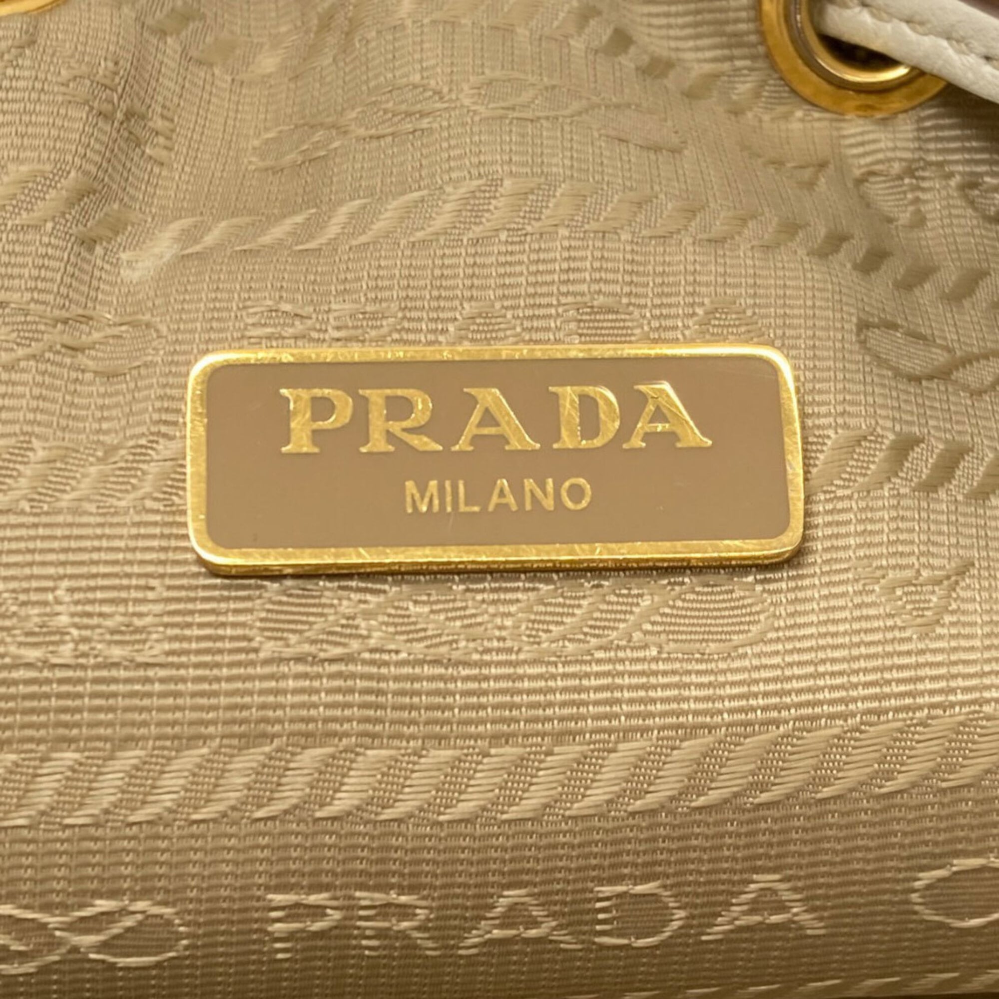 Prada Brown White Canvas Handbag (Pre-Owned)
