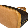 Louis Vuitton Brown Monogram Canvas Handbag (Pre-Owned)