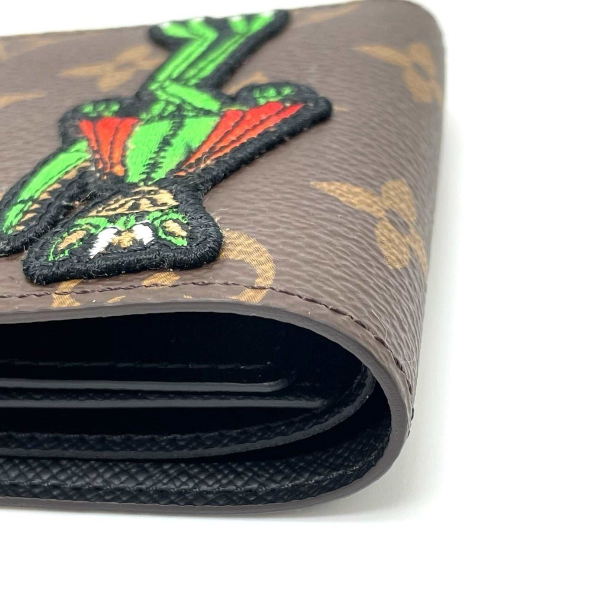Louis Vuitton Brown Monogram Wallet (Bi-Fold) (Pre-Owned)
