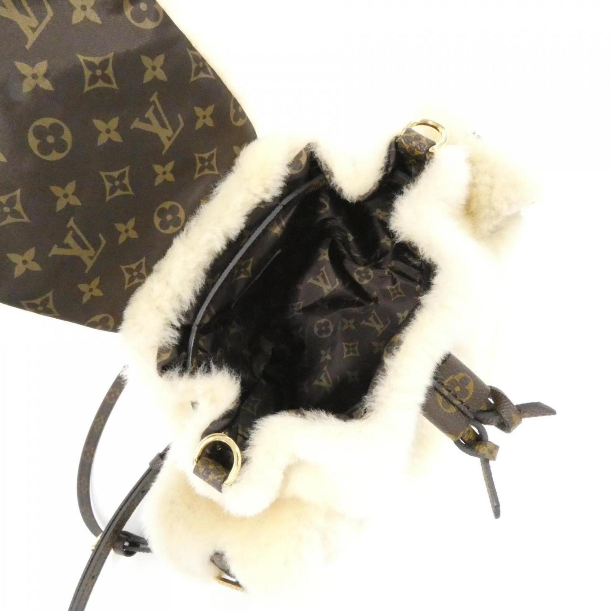 Louis Vuitton Cream Coated Canvas Backpack (Pre-Owned)