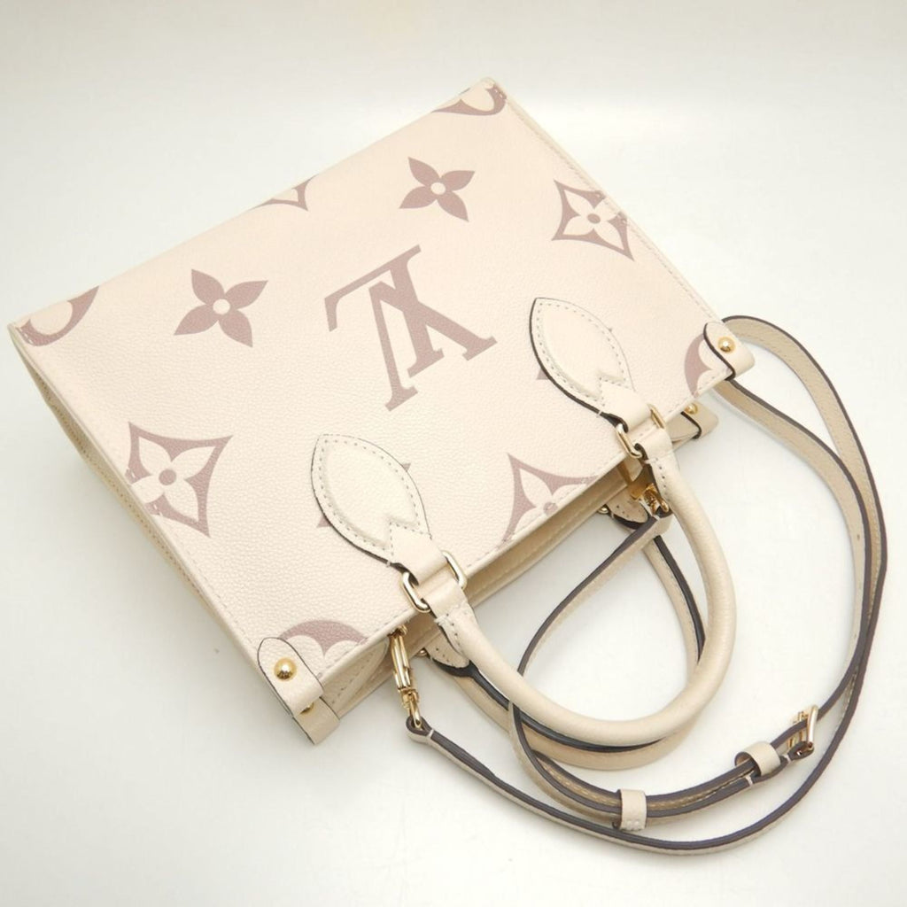 Louis Vuitton Cream Monogram Empreinte Tote Bag (Pre-Owned)