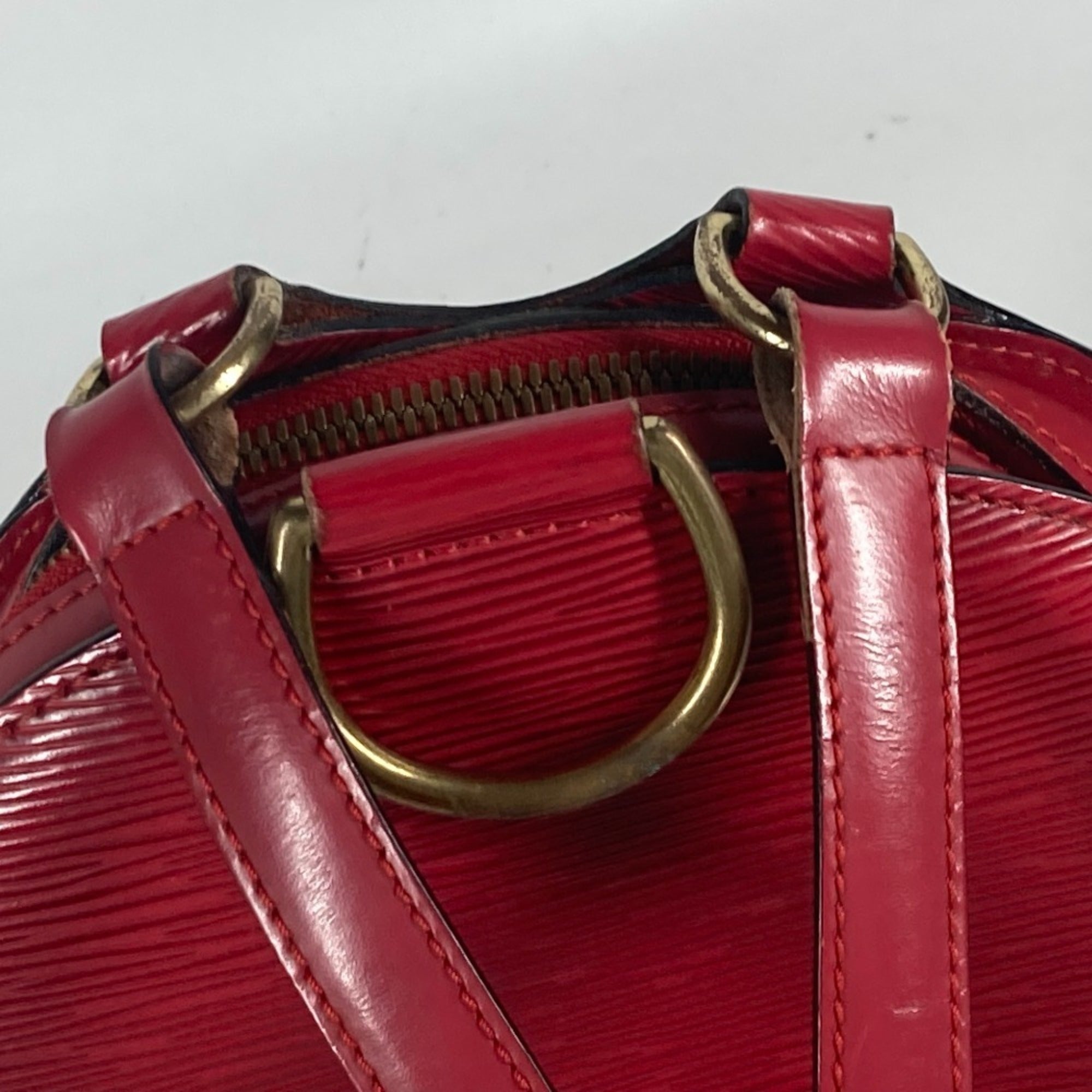 Louis Vuitton Red Color Epi Leather Backpack (Pre-Owned)
