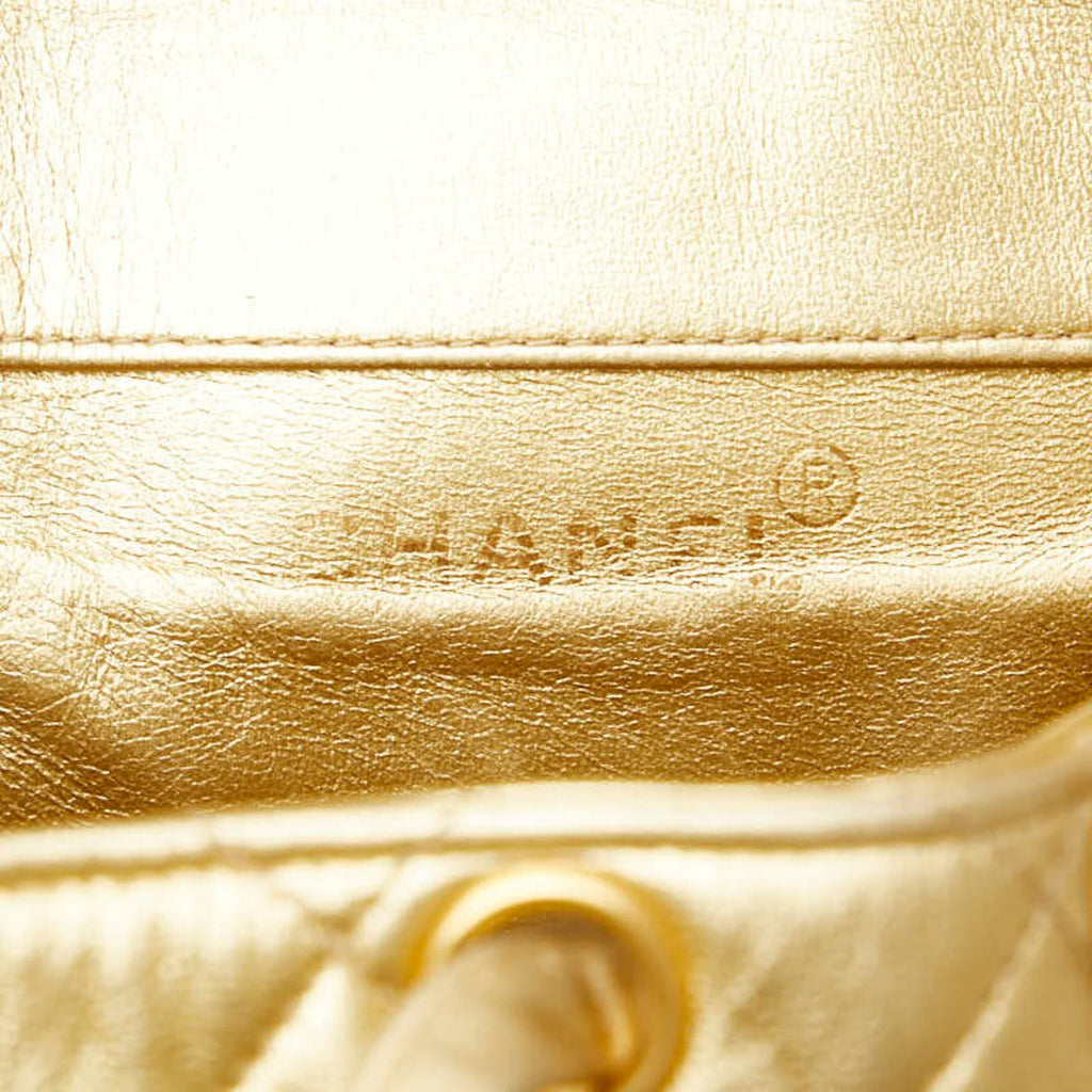 Chanel Gold Leather Backpack (Pre-Owned)