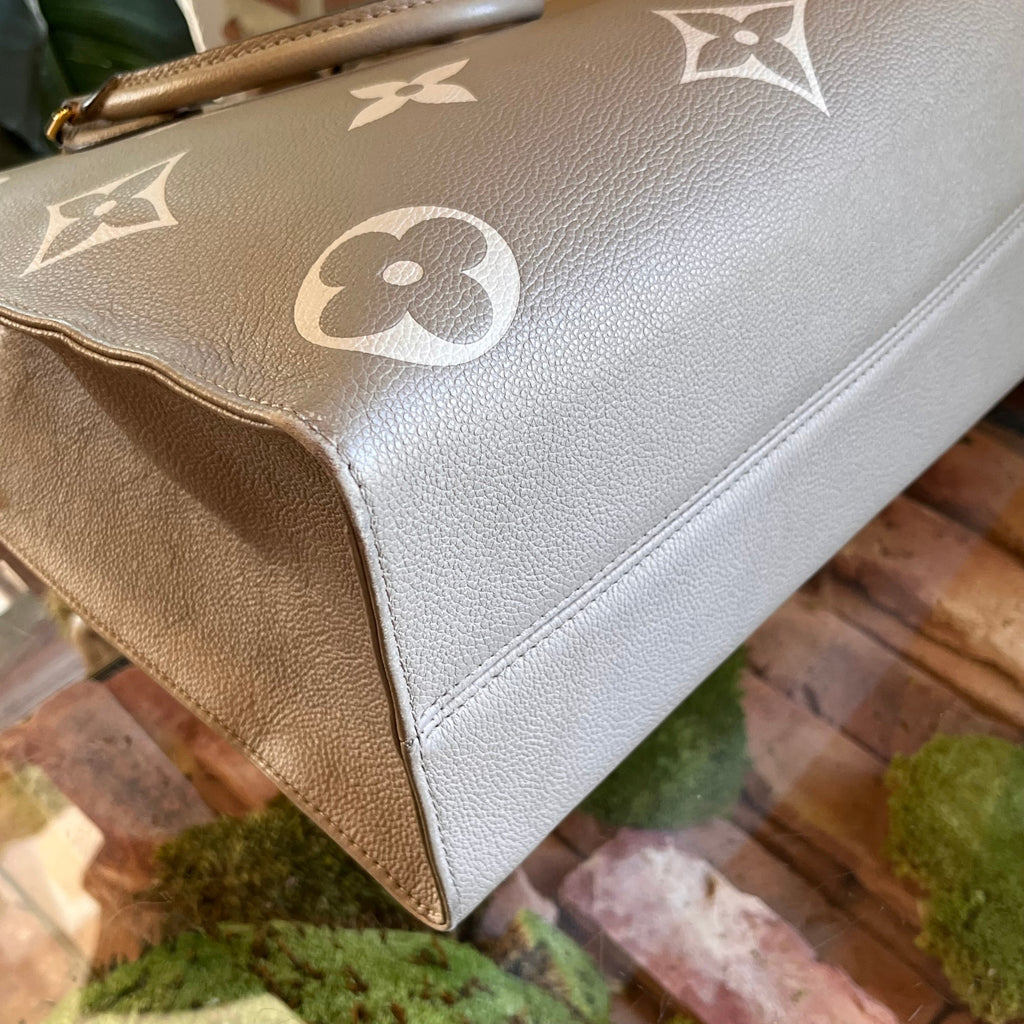 LOUIS VUITTON OnTheGo MM Bicolor Empreinte Giant Monogram Tote Bag
