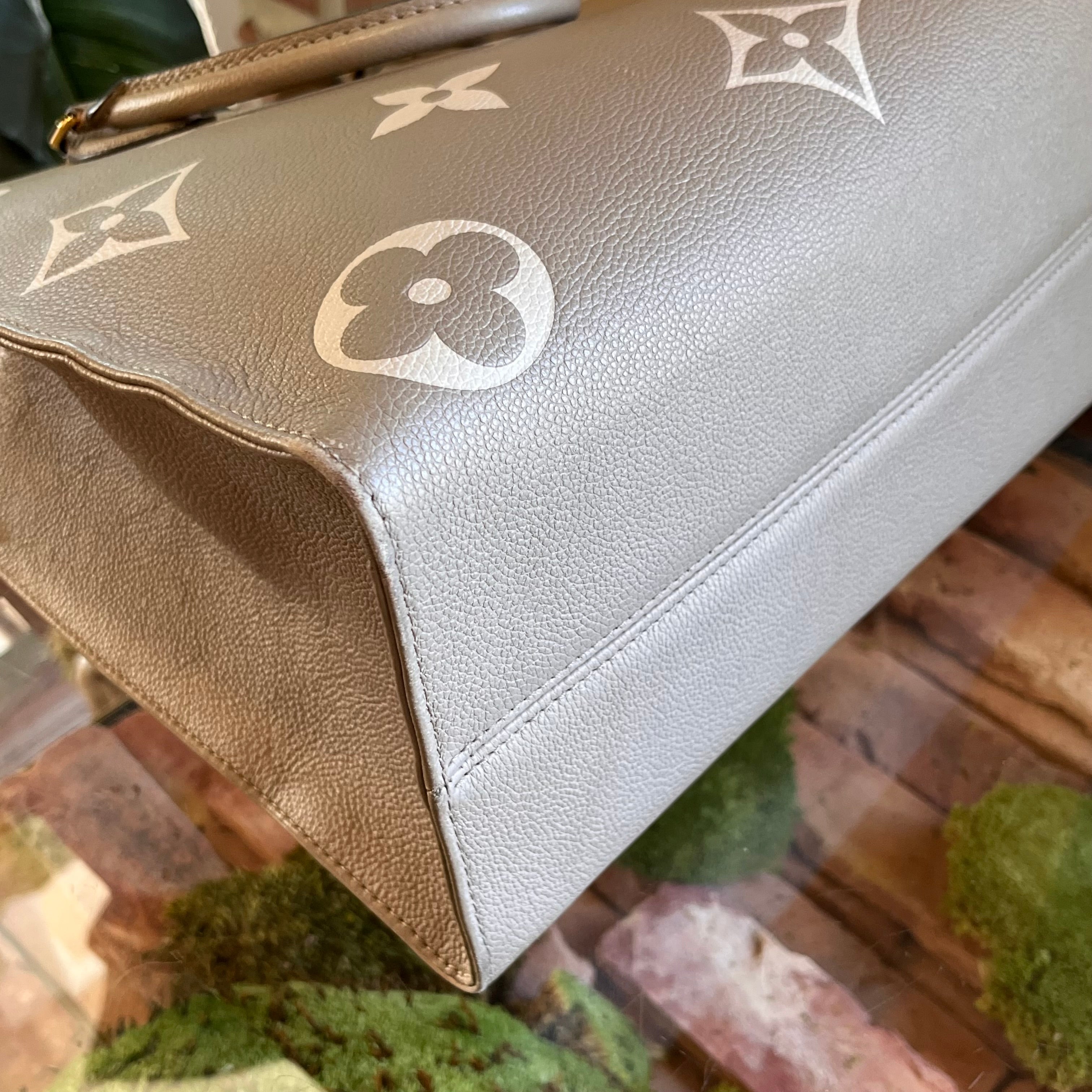 LOUIS VUITTON OnTheGo MM Bicolor Empreinte Giant Monogram Tote Bag