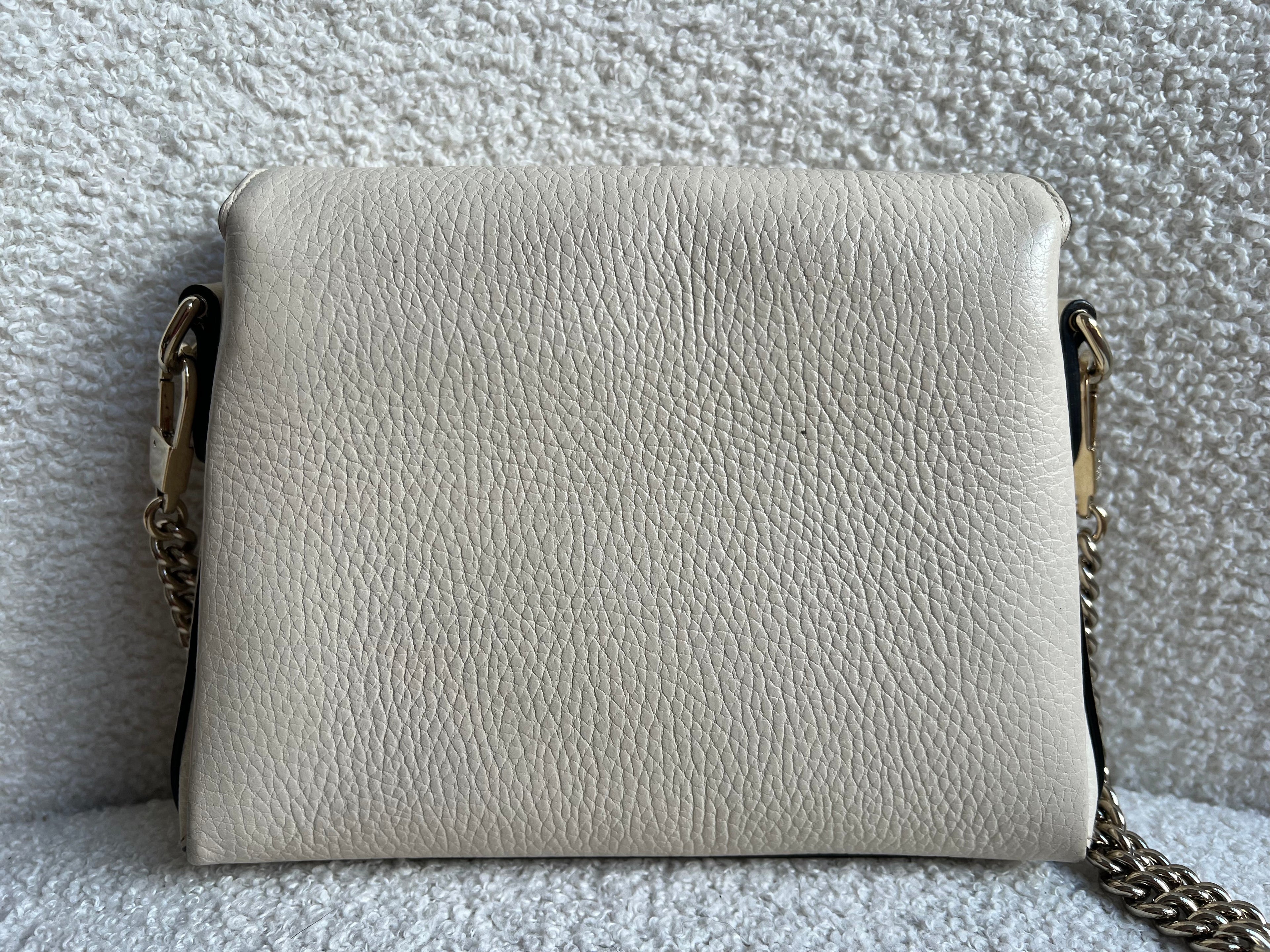 Gucci Interlocking GG Cream Mini Cross Body Bag