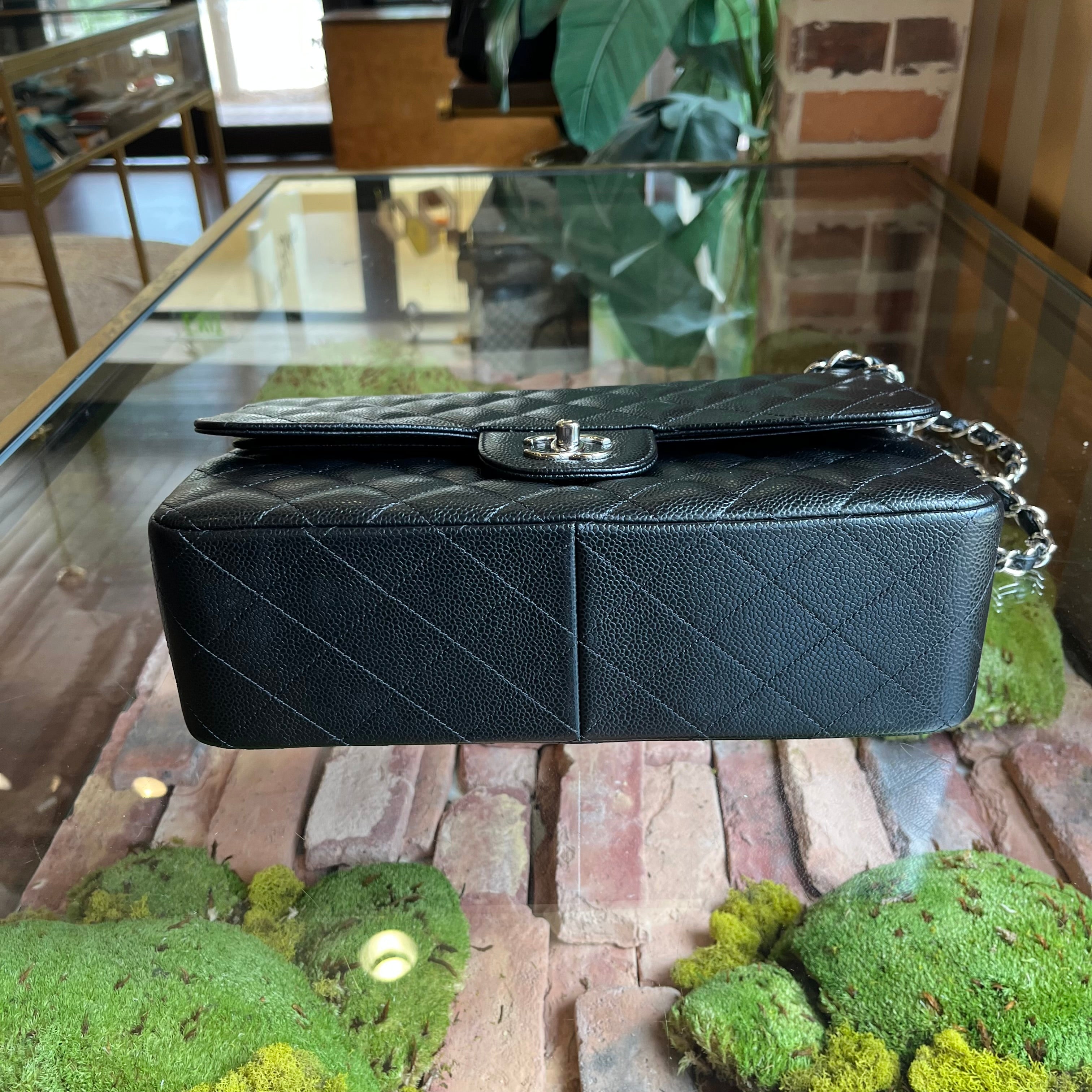 CHANEL Jumbo Double Flap Black Caviar Quilted Leather Shoulder Bag