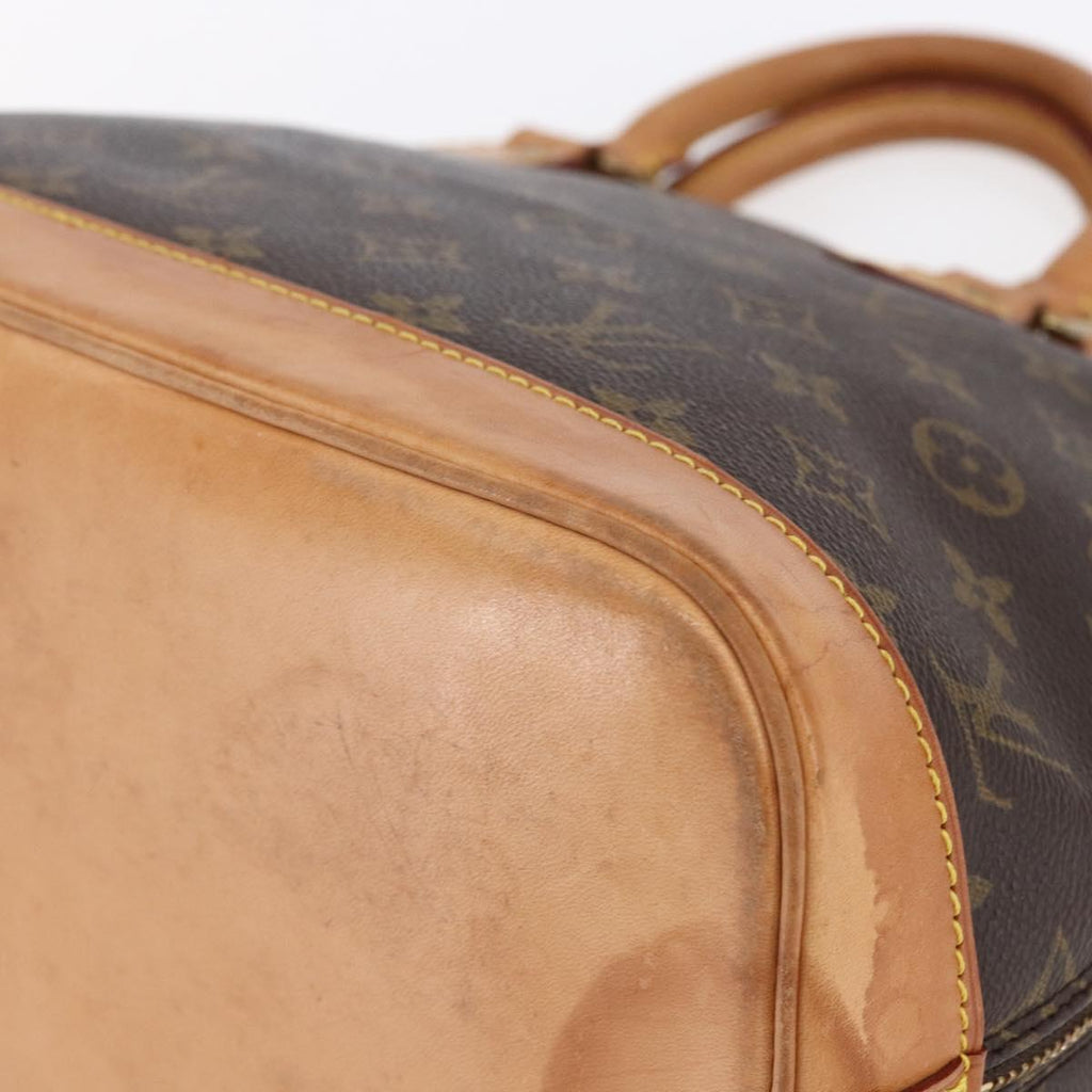 Louis Vuitton Alma Handbag Monogram Canvas Brown Canvas Handbag (Pre-Owned)