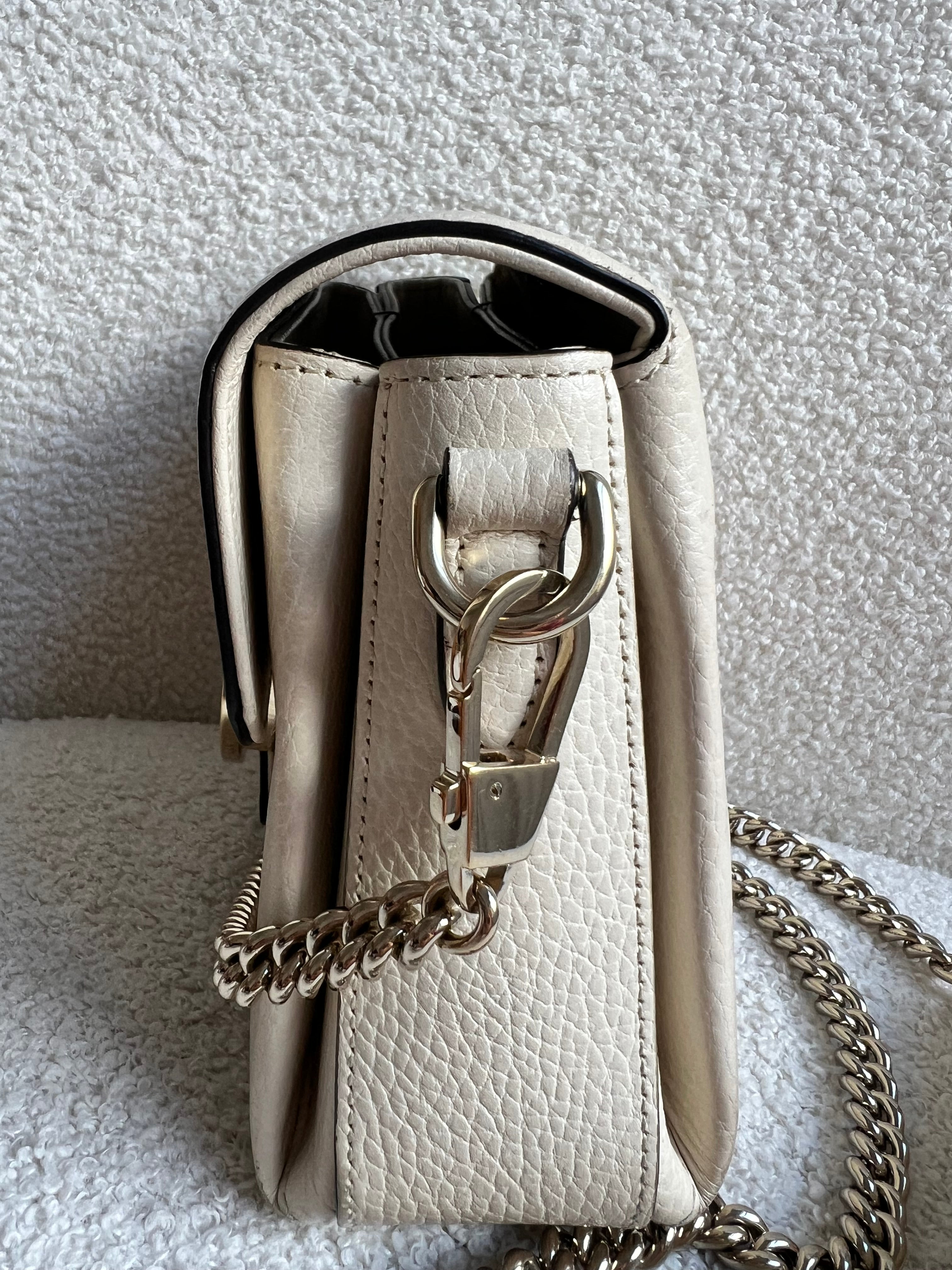 Gucci Interlocking GG Cream Mini Cross Body Bag
