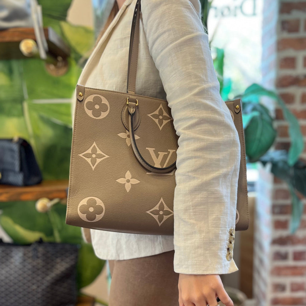 LOUIS VUITTON OnTheGo MM Bicolor Empreinte Giant Monogram Tote Bag