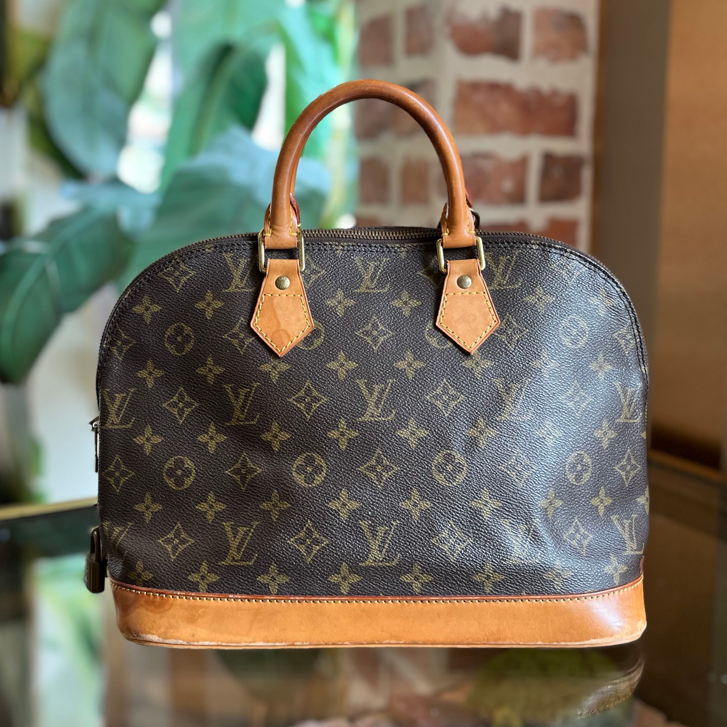 LOUIS VUITTON Alma PM Brown Vintage Monogram Canvas Bag