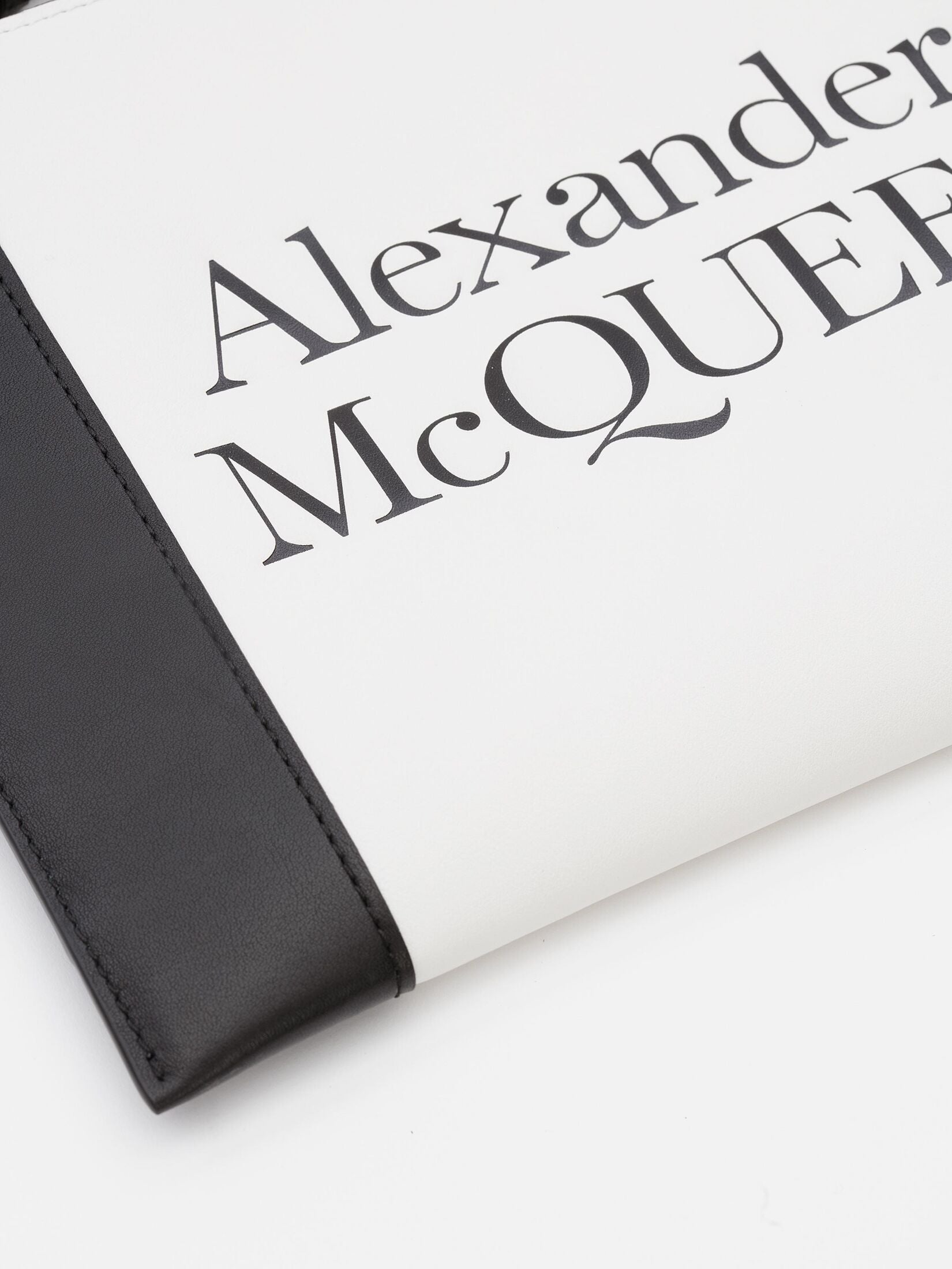 ALEXANDER MCQUEEN SIGNATURE ZIPPER CALFSKIN POUCH WRISTLET