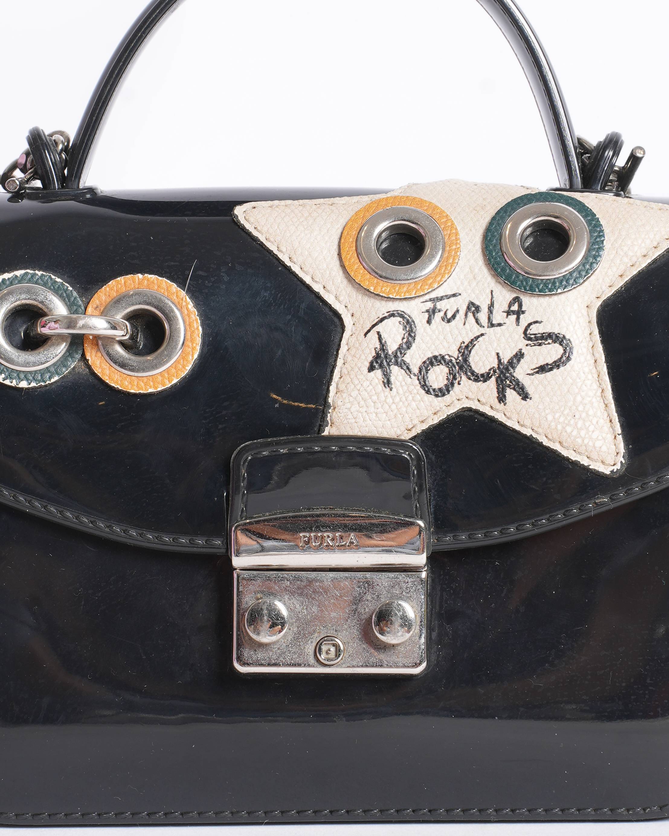 Furla mini metropolis top handle climbing crossbody bag