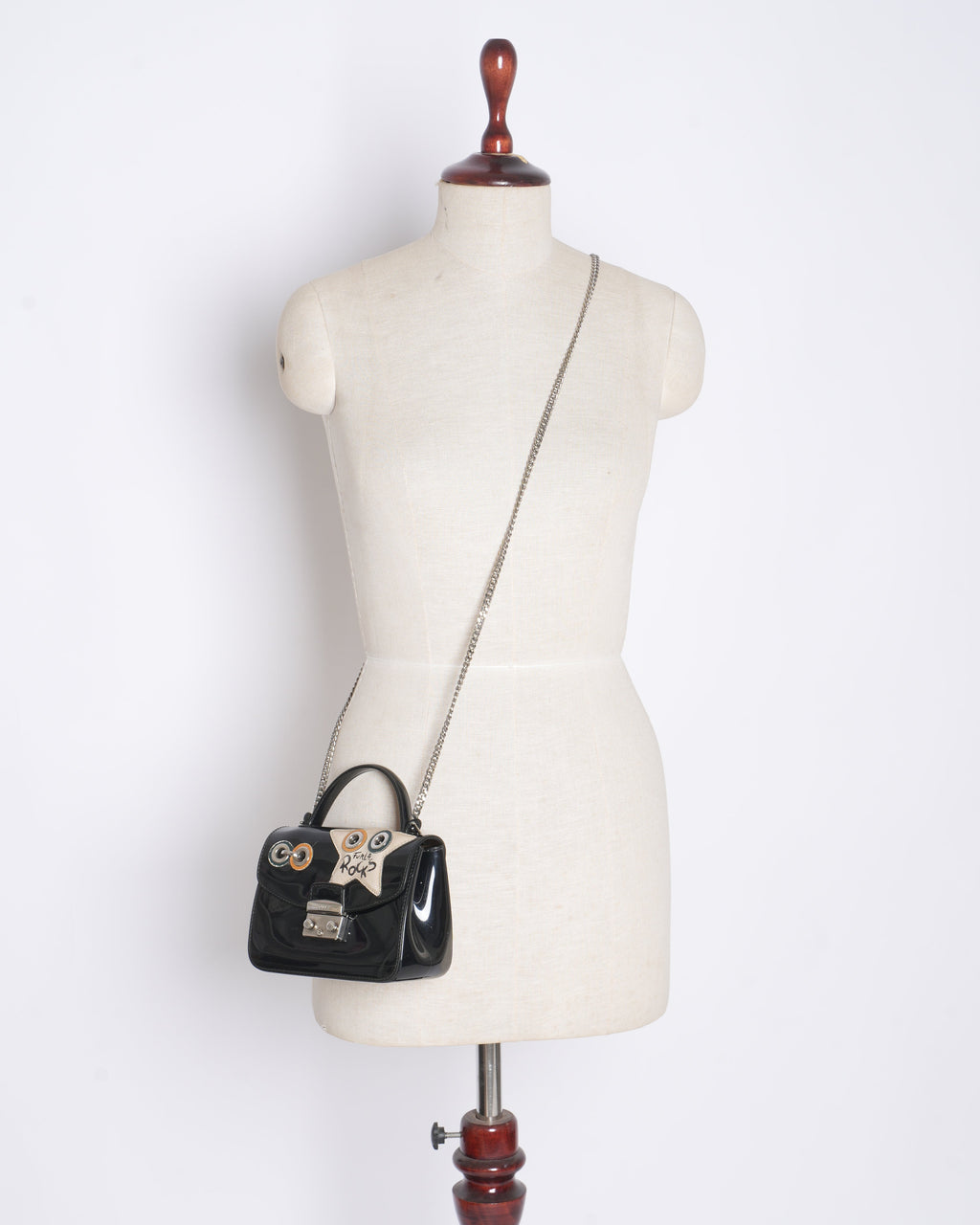 Furla mini metropolis top handle climbing crossbody bag