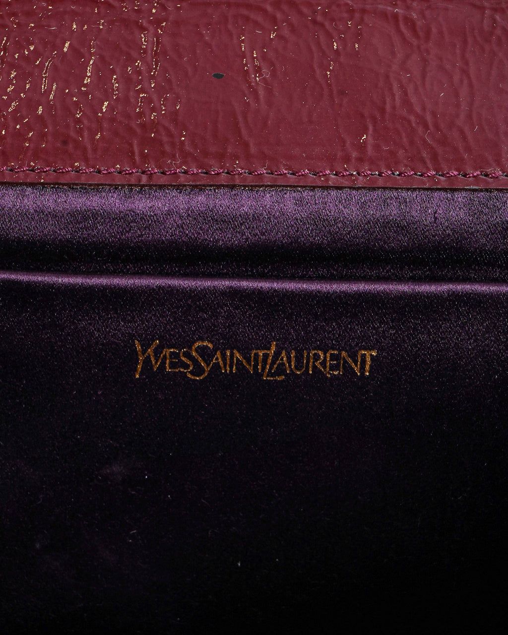Yves Saint Laurent aged leather clutch In burgundy