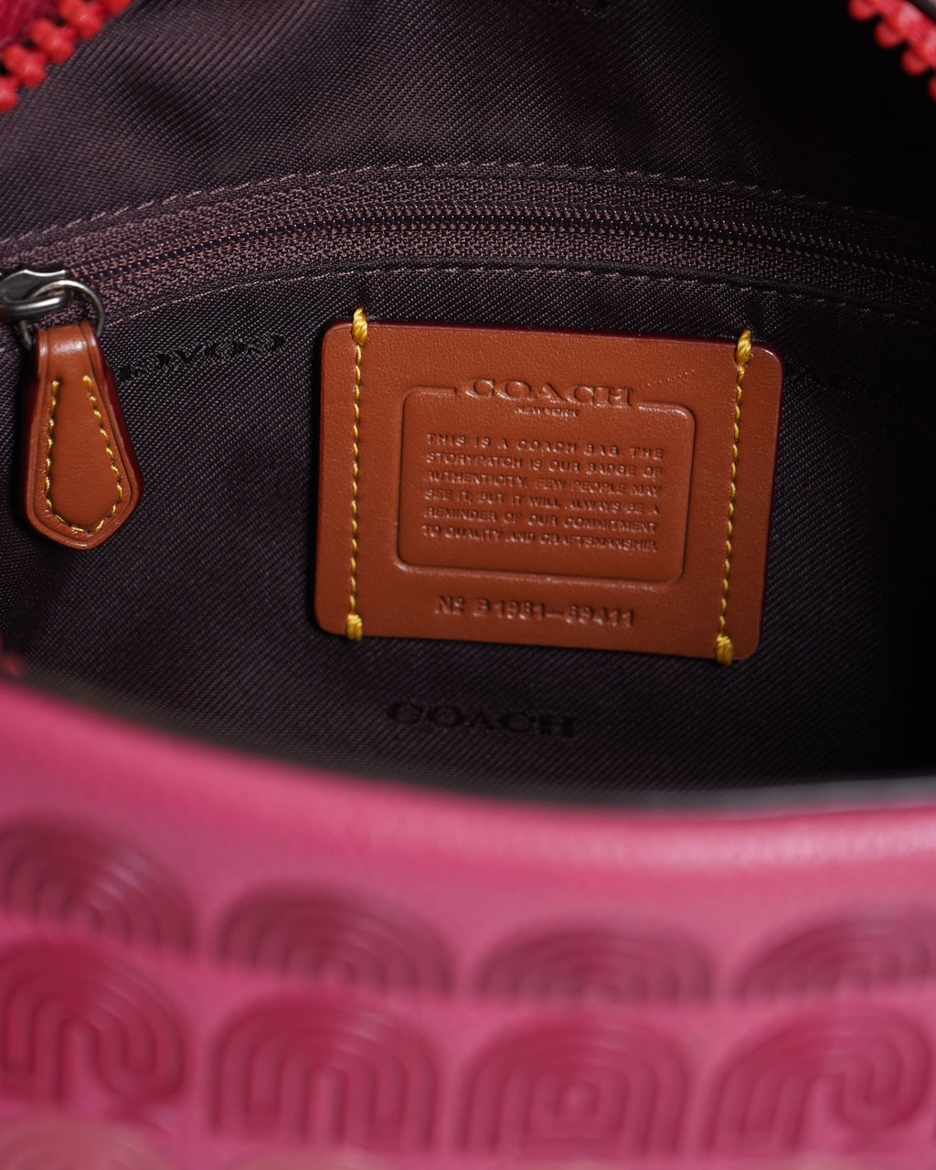 Coach Camera bag with coach print in Pink