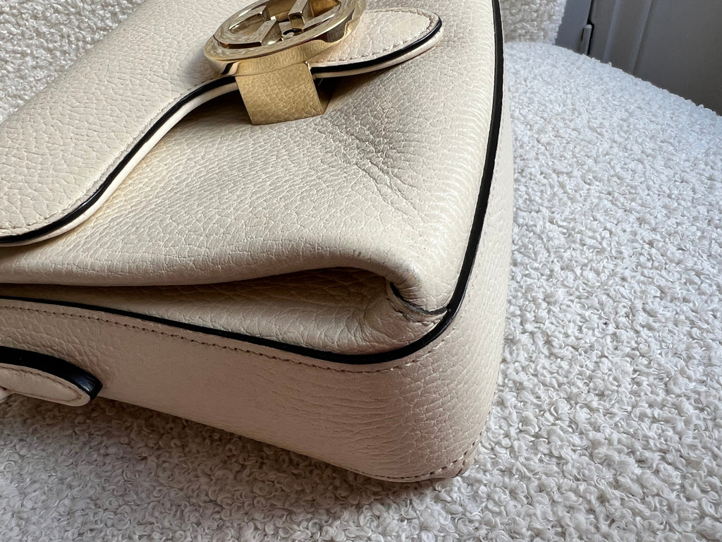 Gucci Interlocking GG Cream Mini Cross Body Bag
