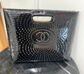 CHANEL CC PERFORATED PATENT CLUTCH BAG