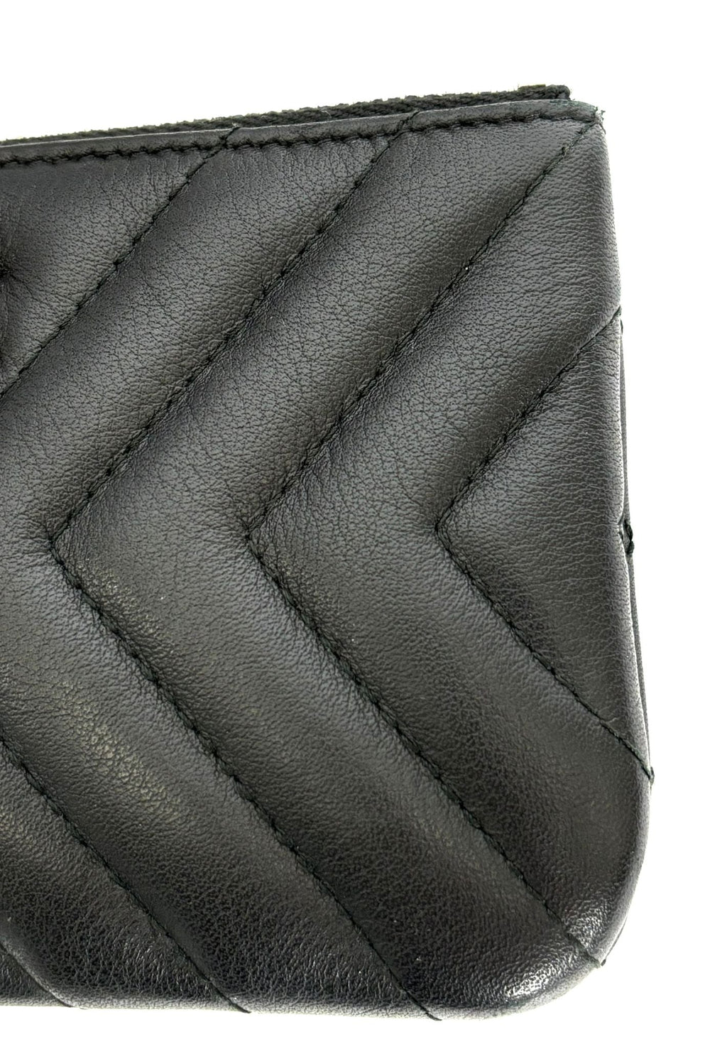 CHANEL LEATHER CHEVRON MINI TASSEL ZIP POUCH