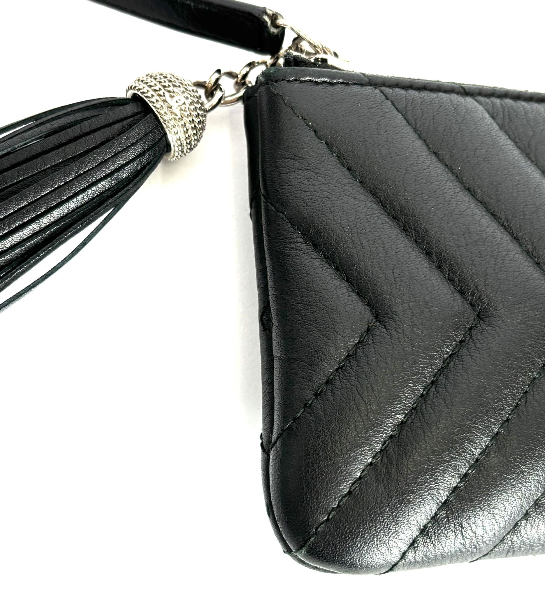 CHANEL LEATHER CHEVRON MINI TASSEL ZIP POUCH