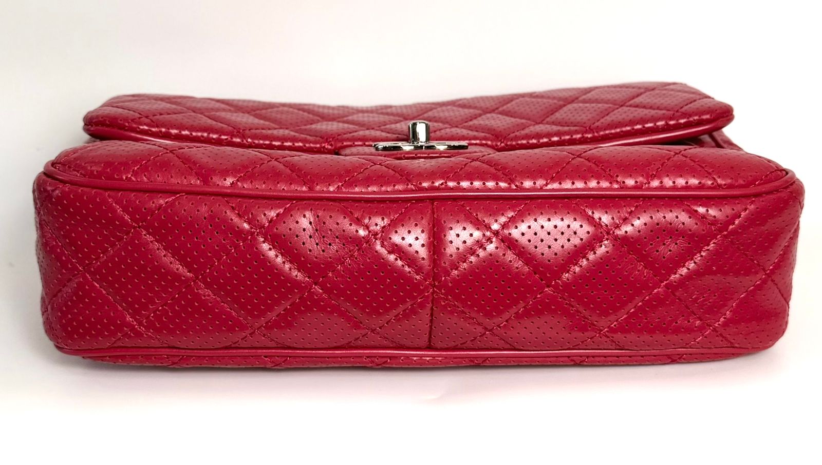 CHANEL PERFORATED LAMBSKIN LEATHER PUNCH JUMBO FLAP BAG