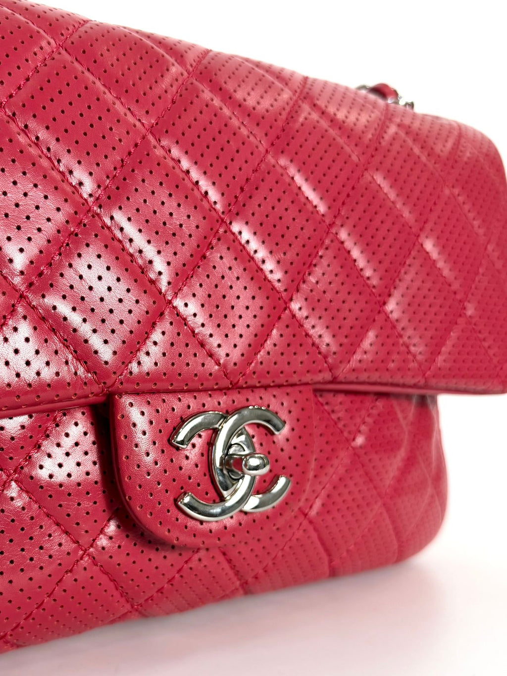 CHANEL PERFORATED LAMBSKIN LEATHER PUNCH JUMBO FLAP BAG
