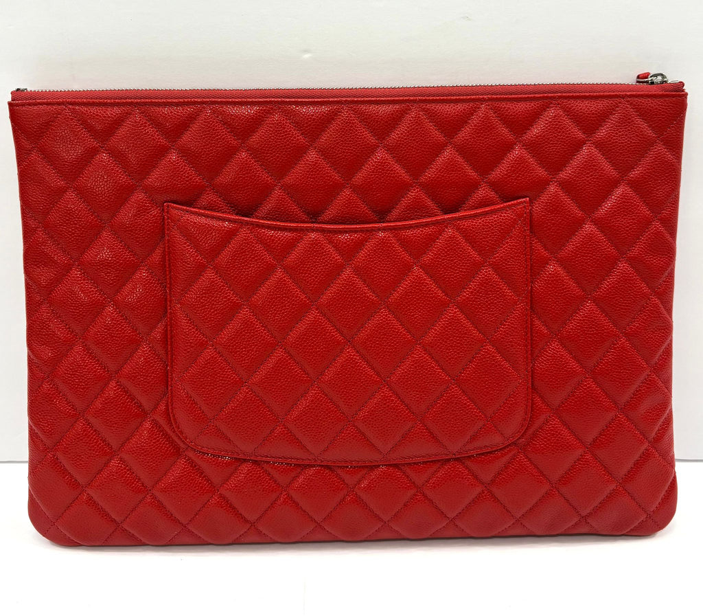 CHANEL QUILTED CAVIAR O CLUTCH BAG