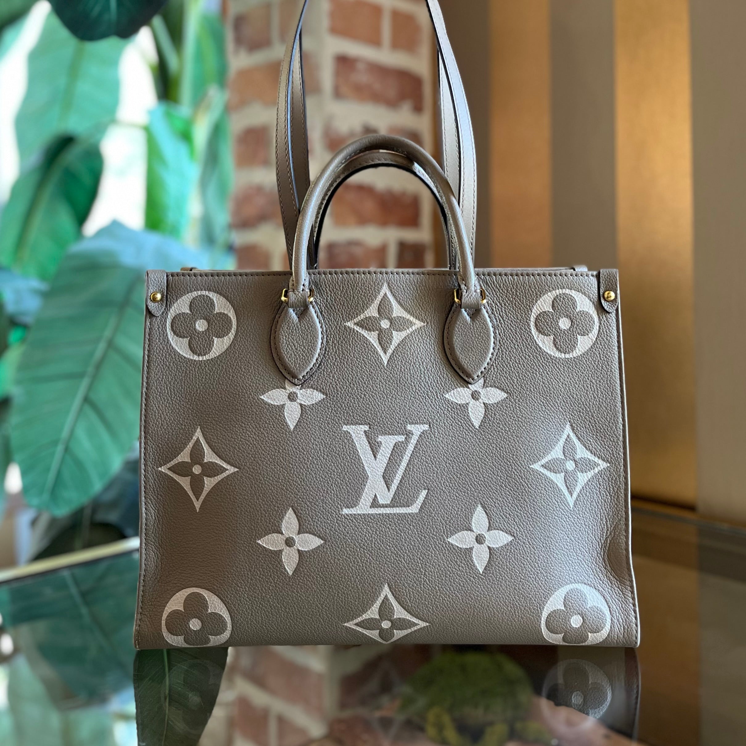 LOUIS VUITTON OnTheGo MM Bicolor Empreinte Giant Monogram Tote Bag