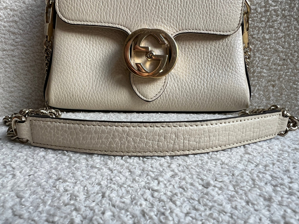 Gucci Interlocking GG Cream Mini Cross Body Bag