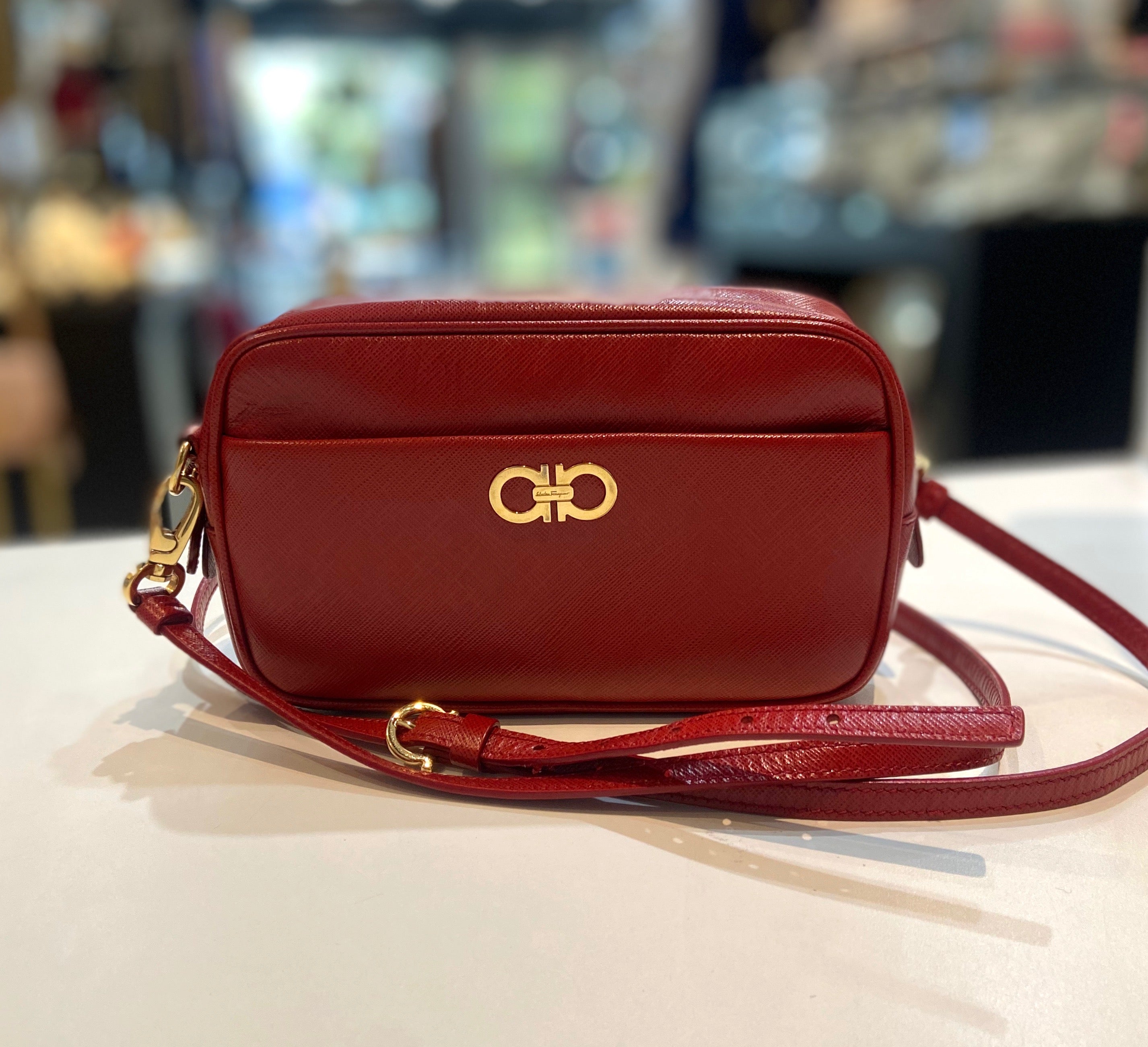 FERRAGAMO GRAINED LEATHER SMALL GANCINI CAMERA BAG