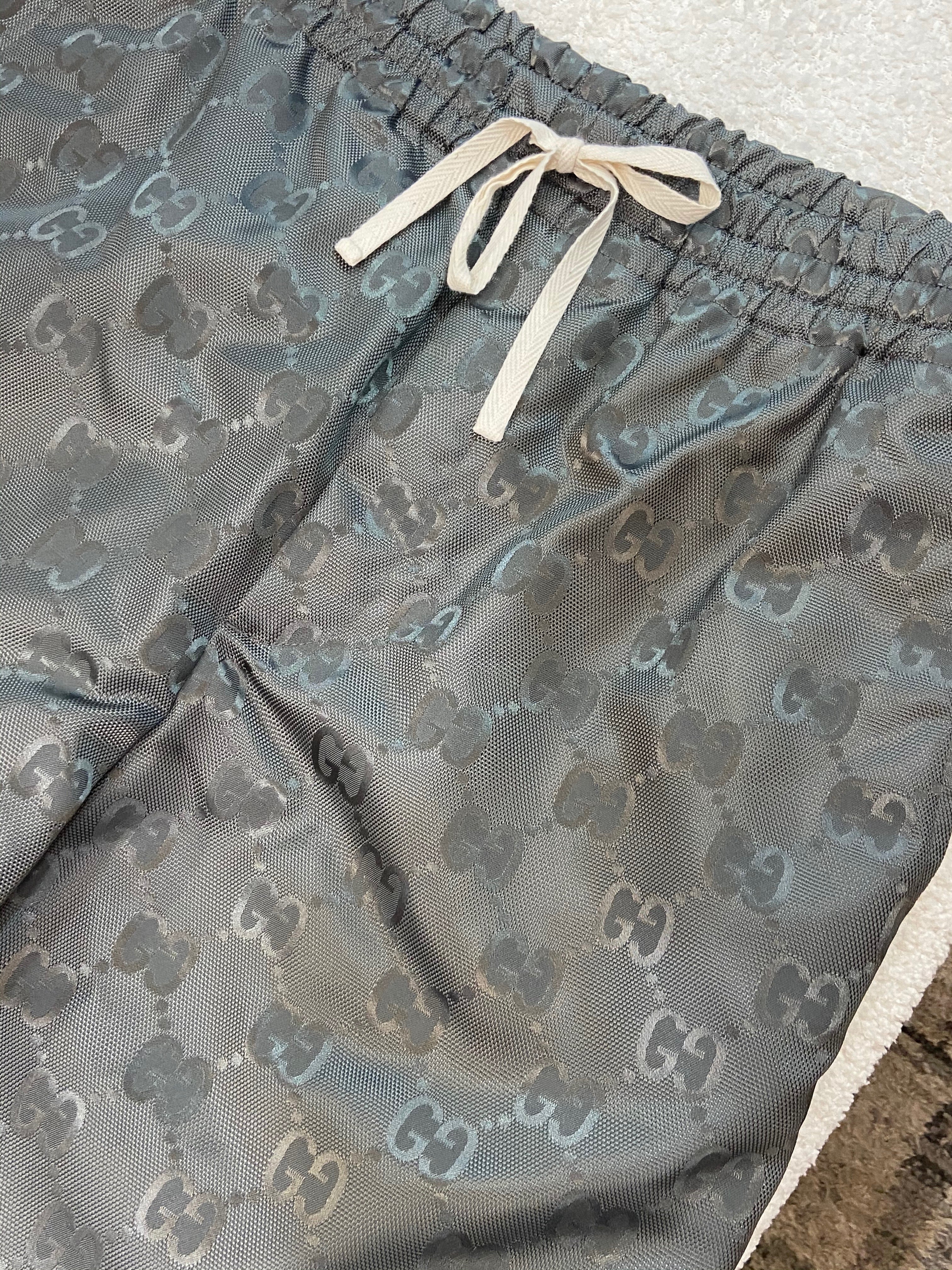 GUCCI OFF THE GRID MONOGRAM LOGO TRACK PANTS