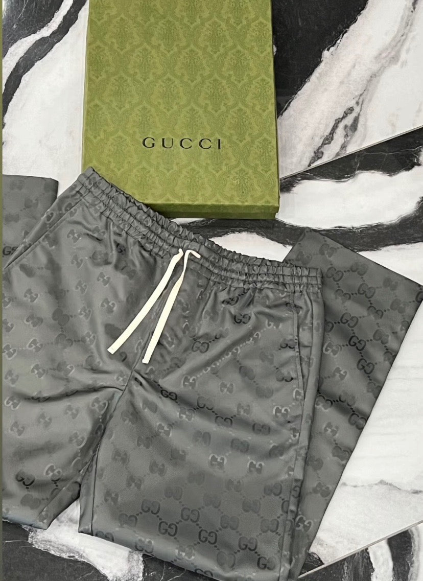 GUCCI OFF THE GRID MONOGRAM LOGO TRACK PANTS