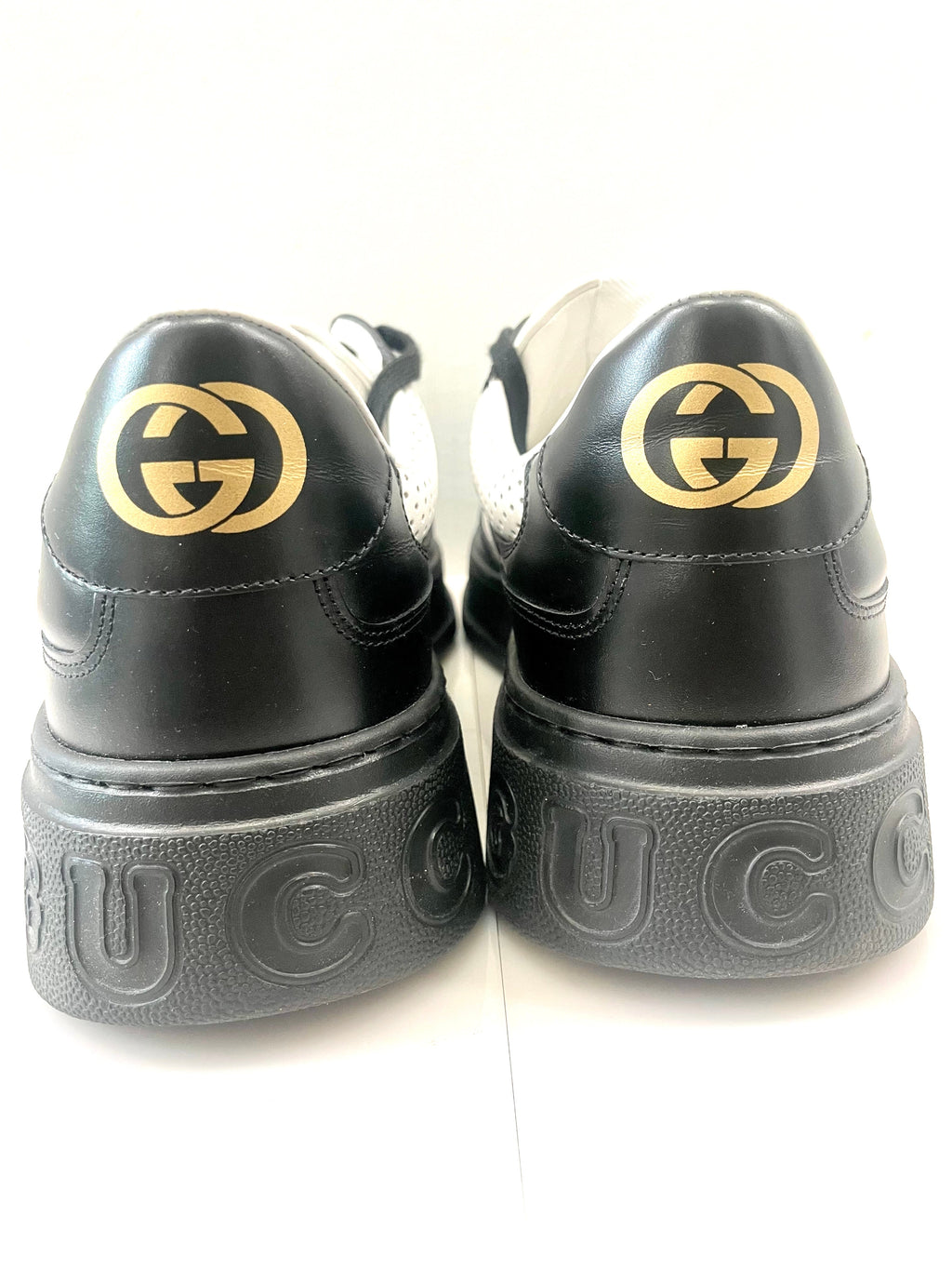 GUCCI GG EMBOSSED LOW-TOP LEATHER SNEAKERS