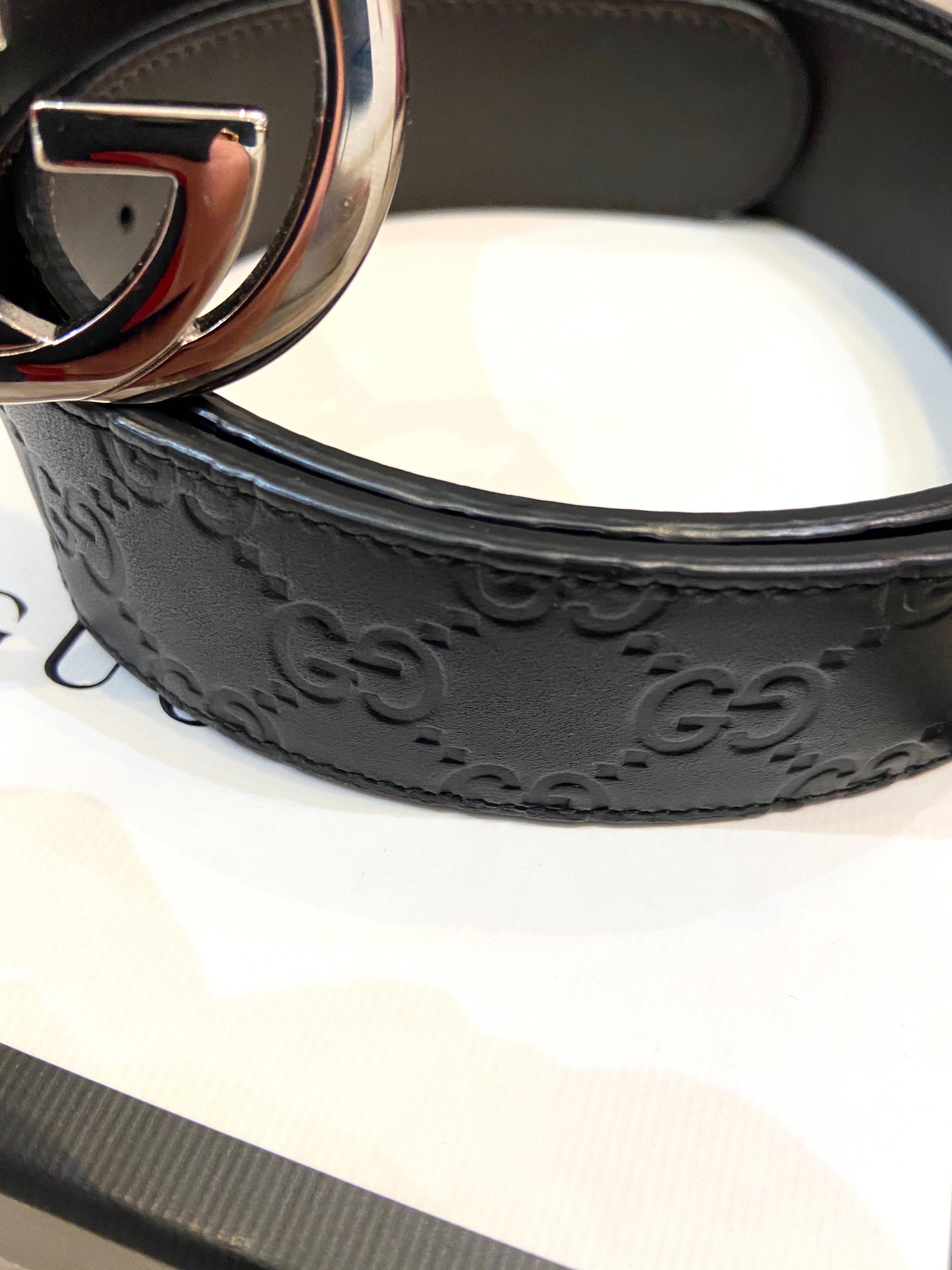 GUCCI INTERLOCKING G EMBOSSED LEATHER BELT