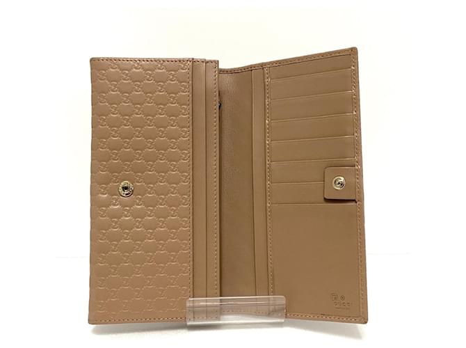 GUCCI MICROGUCCISSIMA FLAP CONTINENTAL LEATHER WALLET