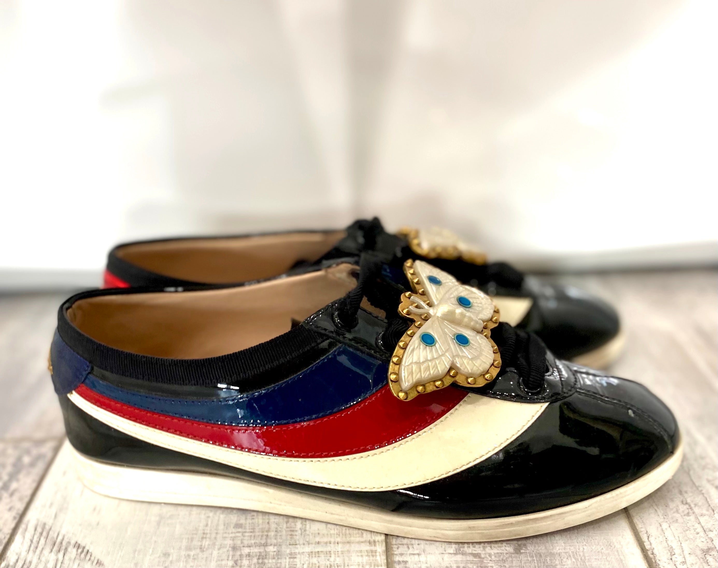 GUCCI PATENT CALFSKIN WEB FALACER BUTTERFLY SNEAKERS