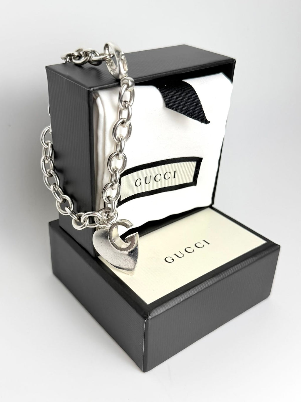 GUCCI GG CUTOUT HEART CHARM STERLING SILVER BRACELET